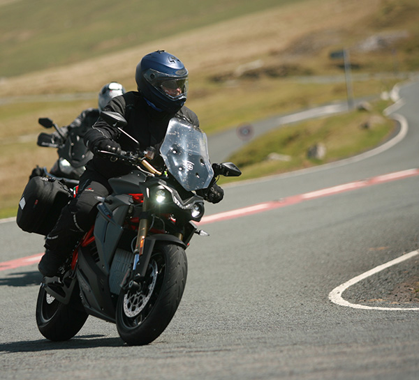 John riding his Energica EVA Ribelle electric motorcycle in Wales in May, 2022